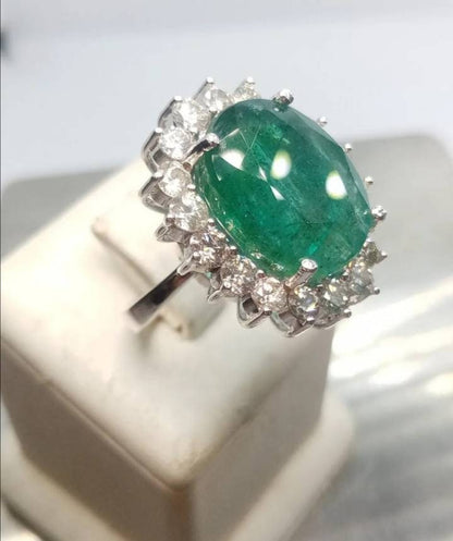 Beautiful 14kt White Gold ring set with untreated Emerald and diamonds total of 16.62ct.