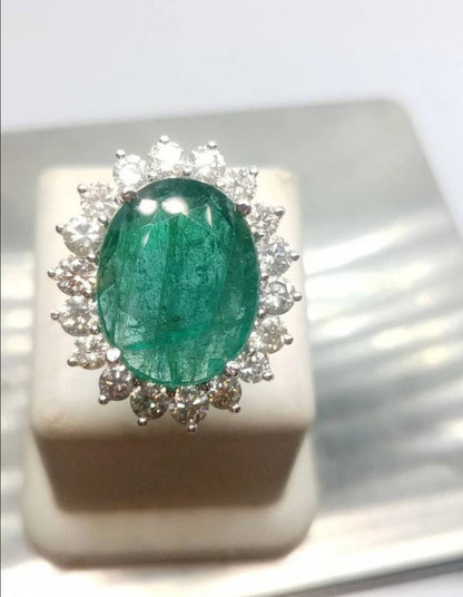 Beautiful 14kt White Gold ring set with untreated Emerald and diamonds total of 16.62ct.