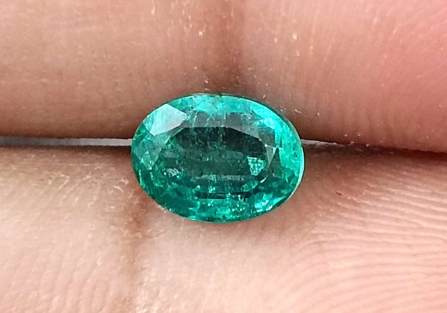 1.26ct Intense green Zambian emerald oval cut minor oiled loose gemstone.