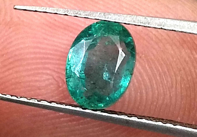 1.26ct Intense green Zambian emerald oval cut minor oiled loose gemstone.