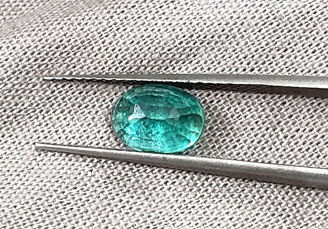 1.26ct Intense green Zambian emerald oval cut minor oiled loose gemstone.