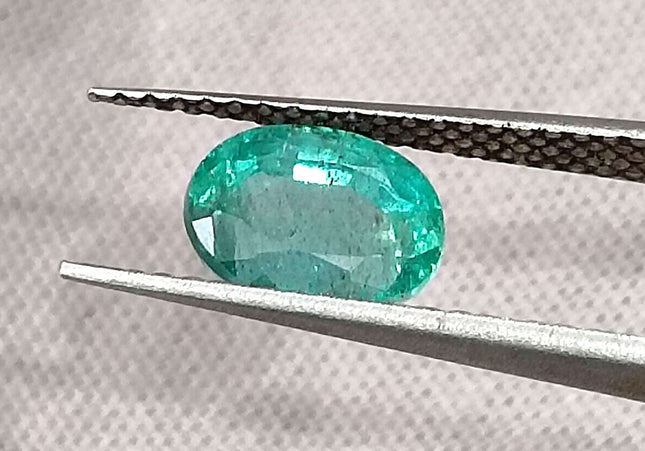 1.26ct Intense green Zambian emerald oval cut minor oiled loose gemstone.