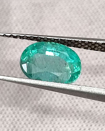 1.26ct Intense green Zambian emerald oval cut minor oiled loose gemstone.