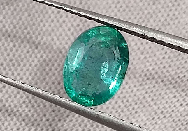 1.26ct Intense green Zambian emerald oval cut minor oiled loose gemstone.