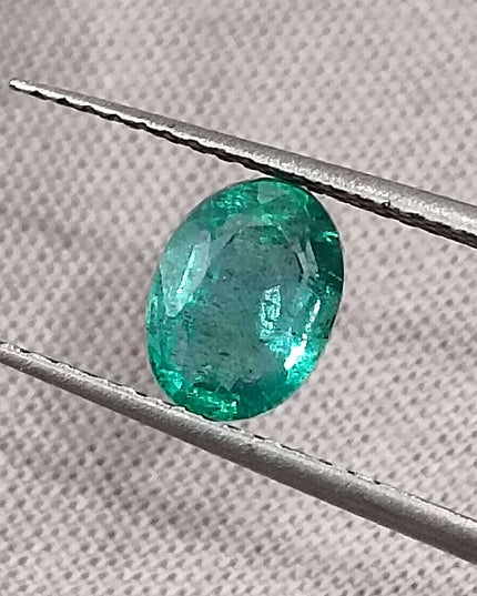 1.26ct Intense green Zambian emerald oval cut minor oiled loose gemstone.