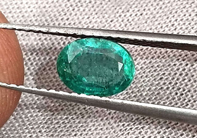 1.26ct Intense green Zambian emerald oval cut minor oiled loose gemstone.