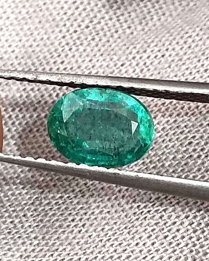 1.26ct Intense green Zambian emerald oval cut minor oiled loose gemstone.