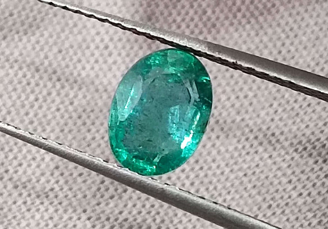 1.26ct Intense green Zambian emerald oval cut minor oiled loose gemstone.